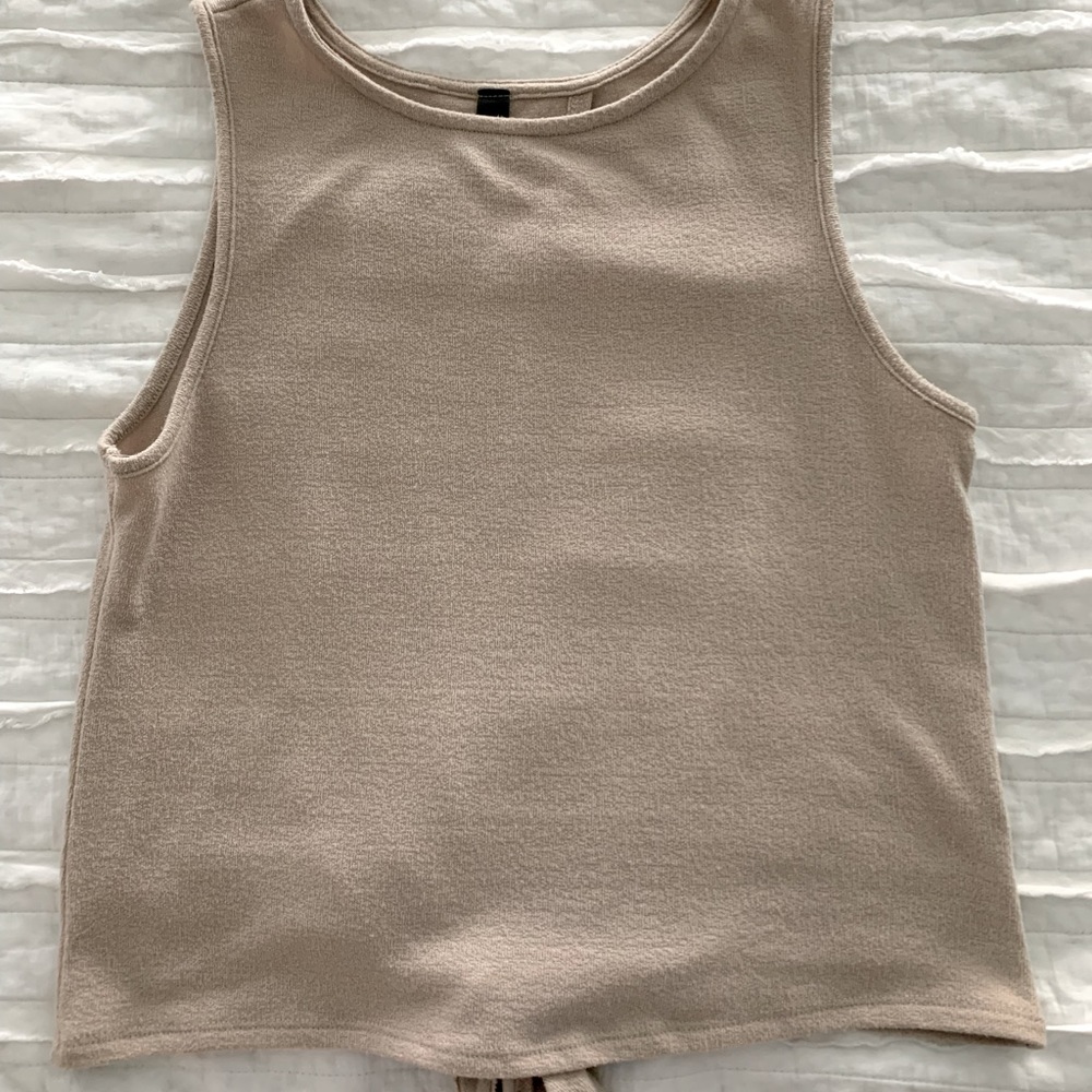 Tan women’s tank with tie open back